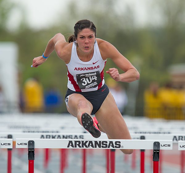 Woman Running Hurdles