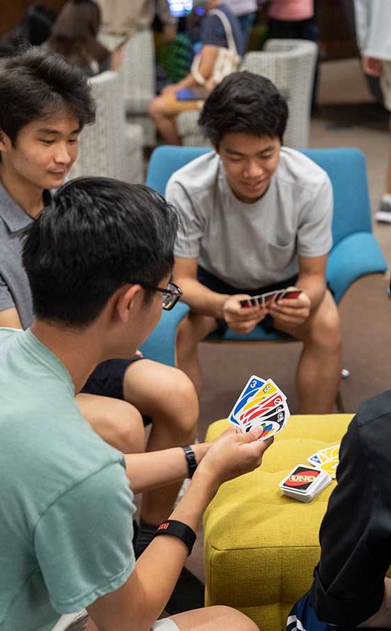 Escapade-Students-Playing-Cards